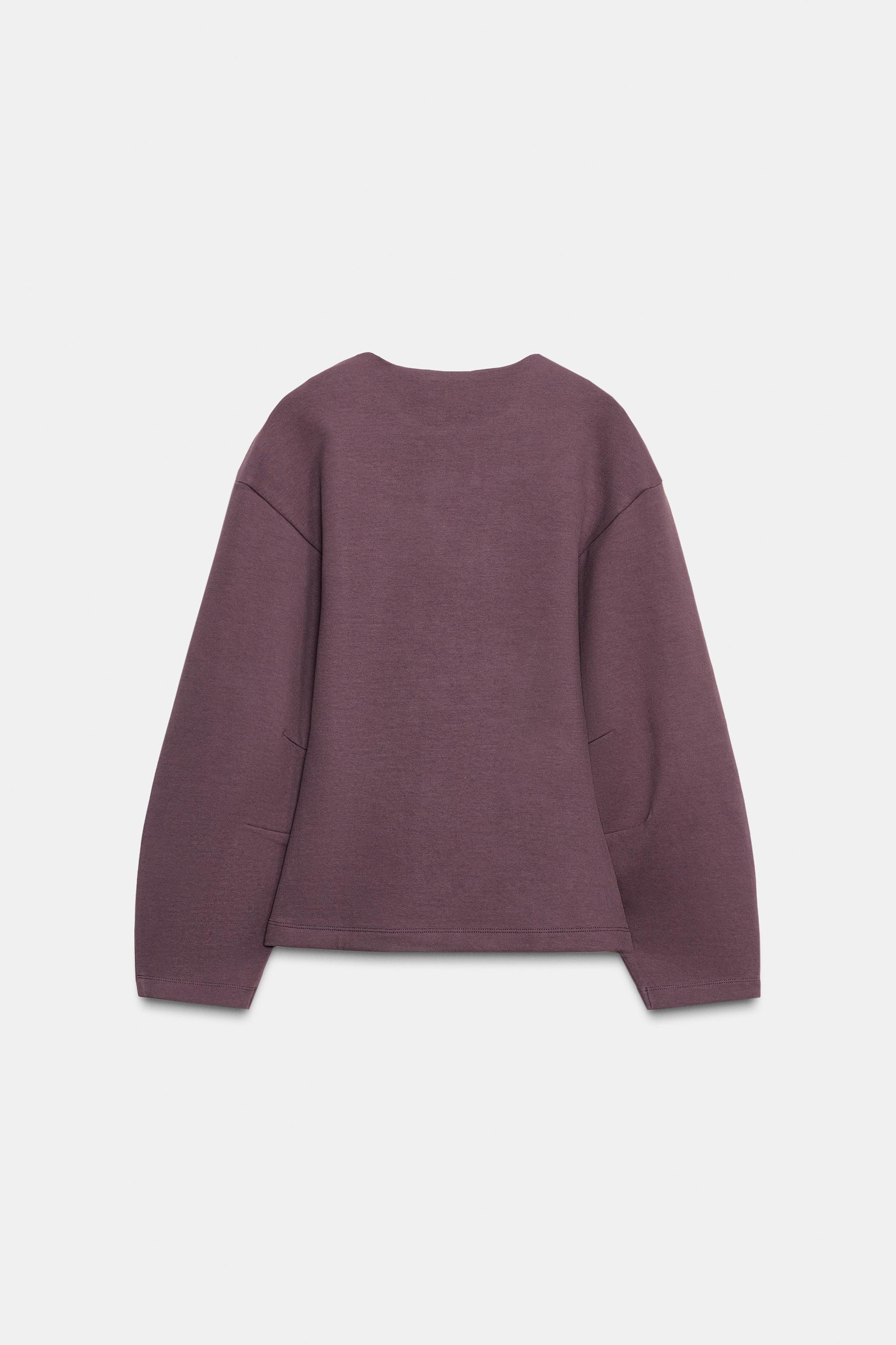 INTERLOCK JUMPER WITH DARTS